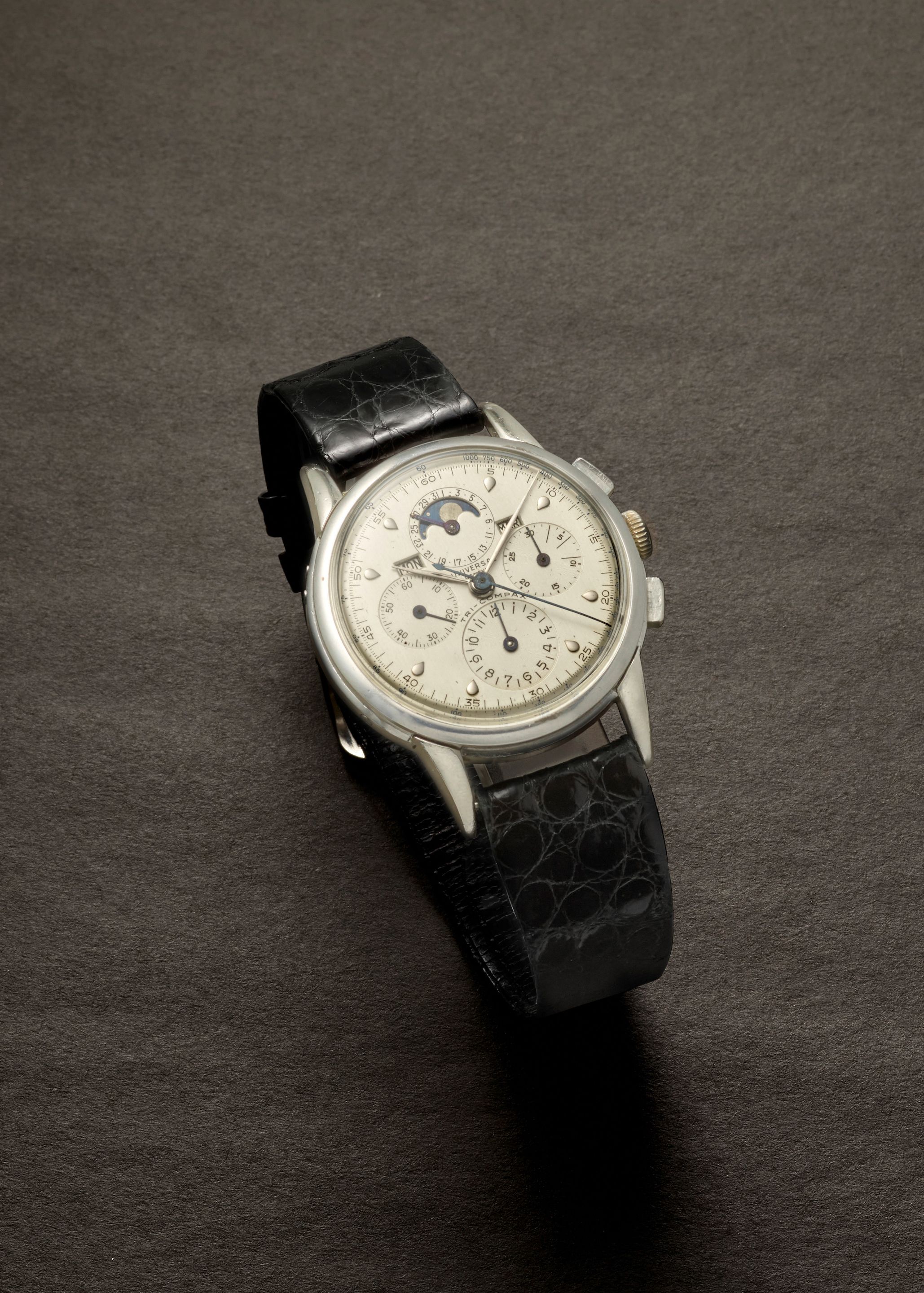 Bonhams : UNIVERSAL GENÈVE. A STAINLESS STEEL MANUAL WIND TRIPLE 