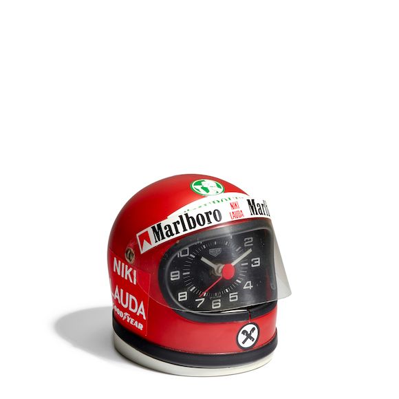 Bonhams A MINIATURE F1 LAUDA CAVALLINO QUARTZ HELMET