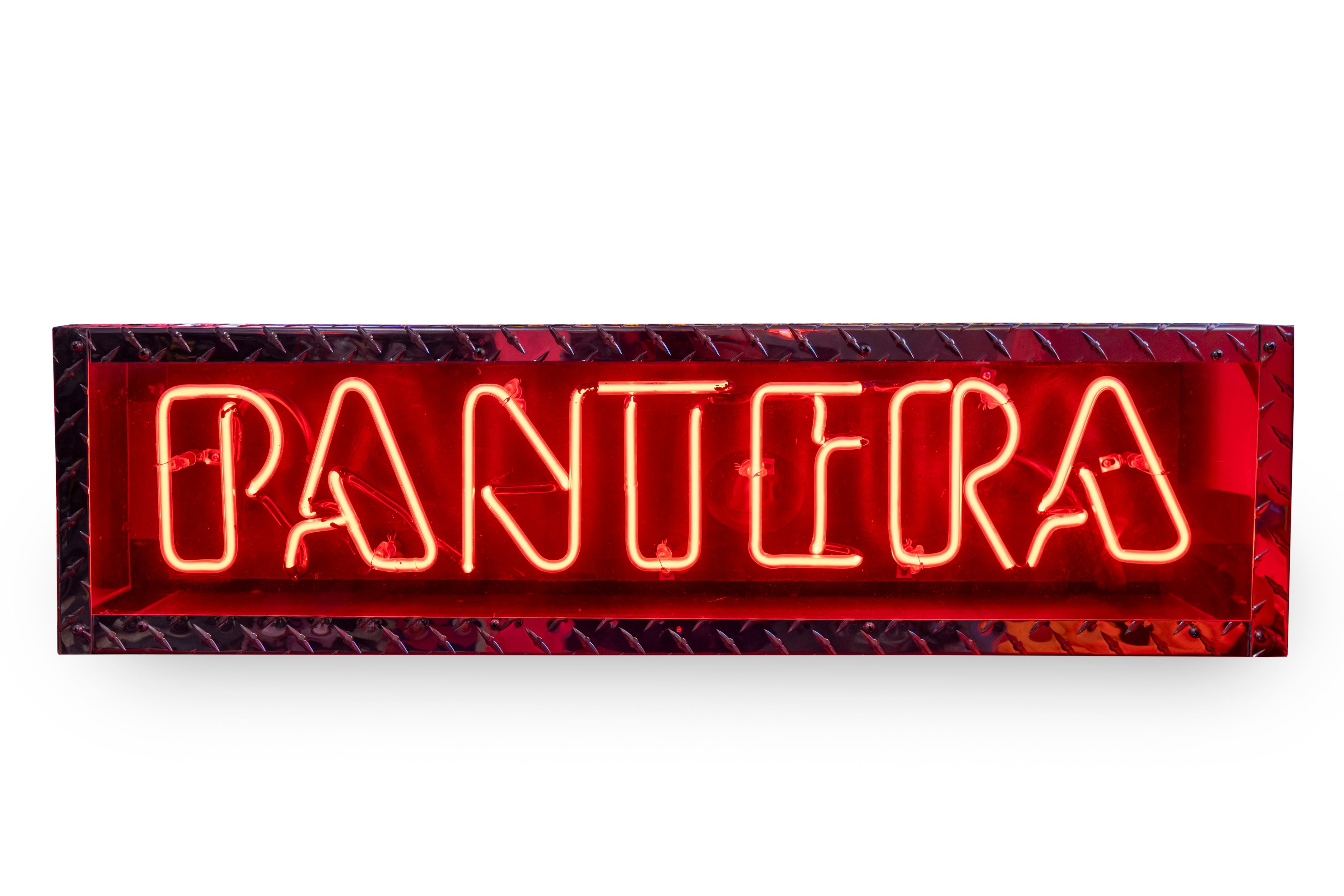 A Pantera script neon sign,