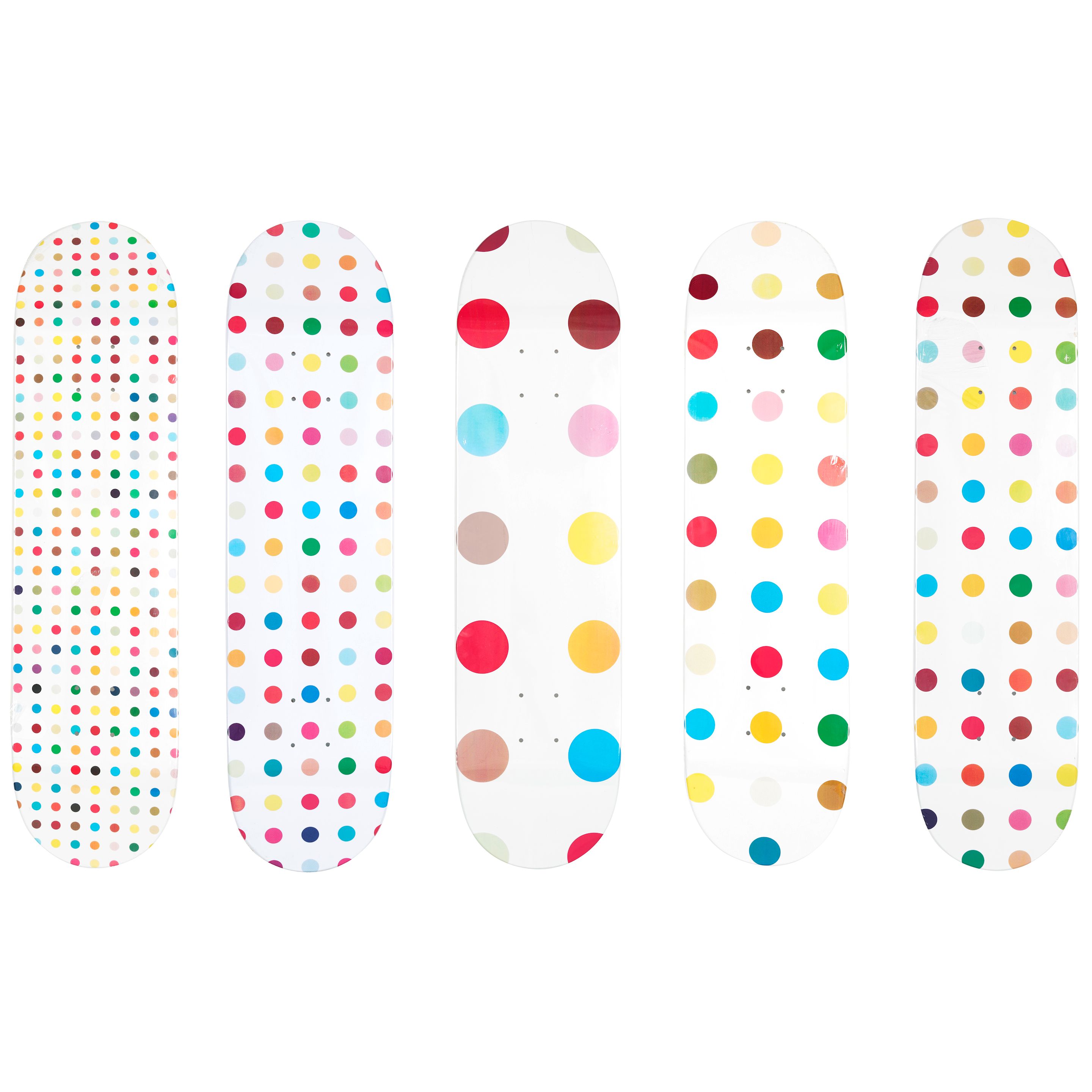 A Group of 5 Dots Skateboards