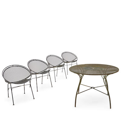 Four Maurizio Tempestini (1908-1960) For Salterini 'Radar' Chairs and a Table United States, circa 1955, wrought iron, steel mesh, unmarked, chairs, ht. 29 1/2, seat ht. 17, wd. 25, dp. 20, table, ht. 29, dia. 41 1/2 in.
