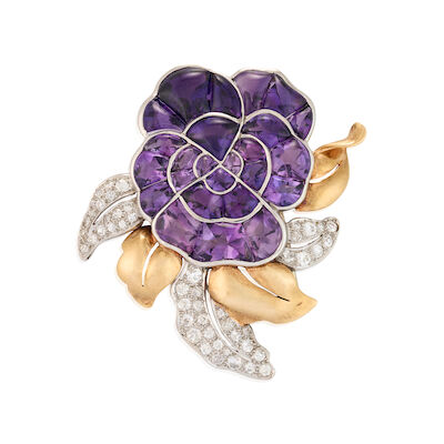 SEAMAN SCHEPPS: AN AMETHYST AND DIAMOND FLOWER BROOCH, CIRCA 1940s