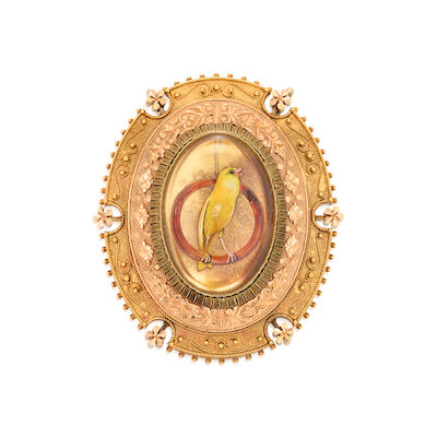 AN ANTIQUE BICOLOR GOLD AND ESSEX CRYSTAL PENDANT