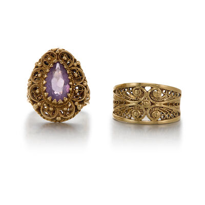 TWO GOLD AND AMETHYST RINGS