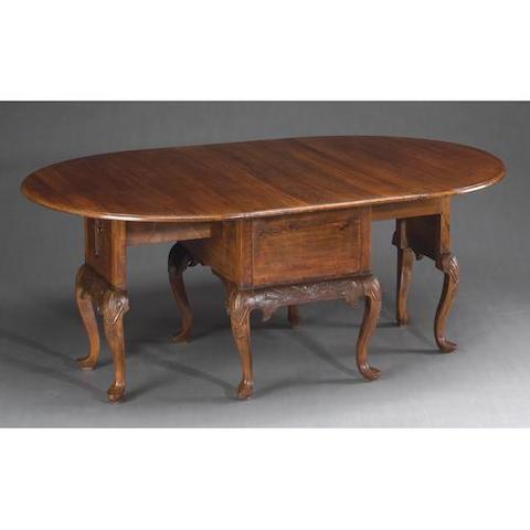 A Continental Baroque beech dining table