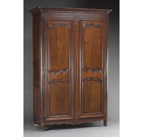 A Louis XV oak armoire
