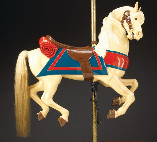 A carved and painted wood carousel horse