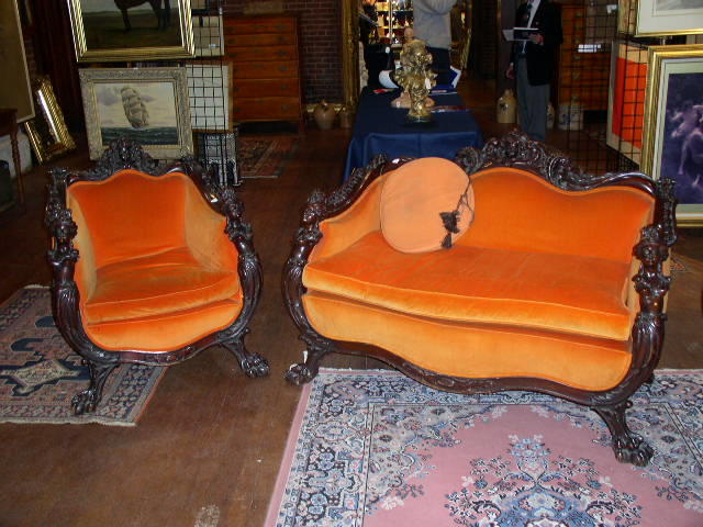 An American Art Nouveau carved mahogany settee and bergere