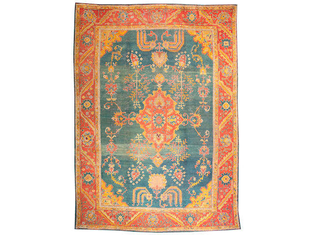 An Oushak carpet West Anatolia, Size approximately 12ft 2in x 17ft 2in