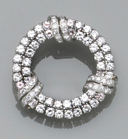 A diamond and platinum circle pin, Tiffany & Co