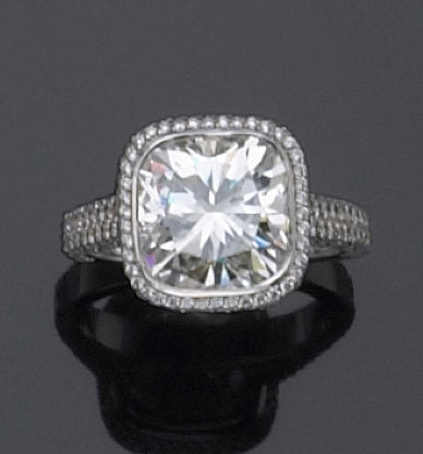 A diamond and eighteen karat white gold ring
