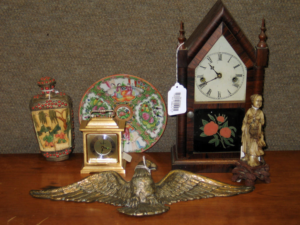 A large assembled grouping of decorative items