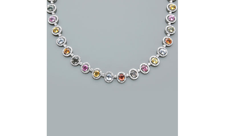 A multi-colored sapphire, diamond and eighteen karat white gold necklace