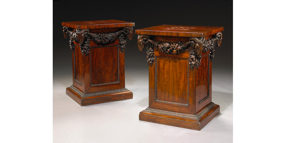 A pair of good quality William IV carved mahogany pedestal cupboards