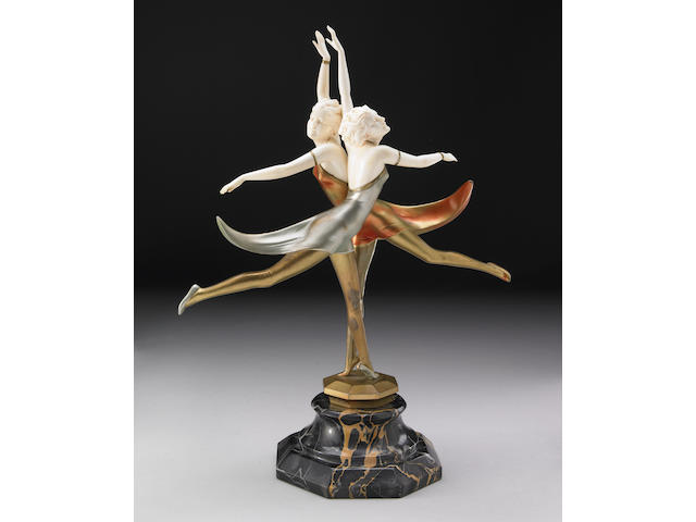 A cold-painted bronze and ivory group: Butterfly Dancers