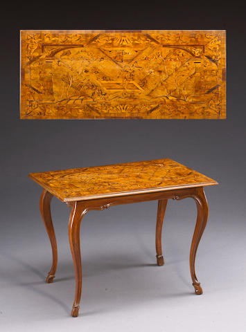 An Italian Baroque marquetry and fruitwood table