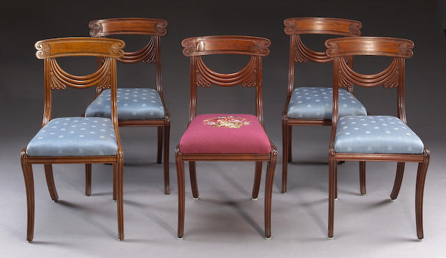 A set of five Classical carved mahogany klismos chairs