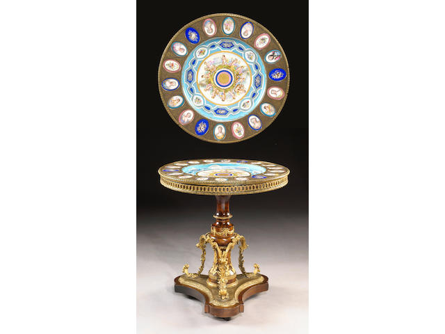 A Napoleon III gilt bronze and porcelain mounted table de milieu
