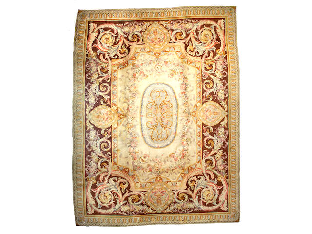 A Savonnerie carpet France, Size approximately 16ft 2in x 12ft 6in