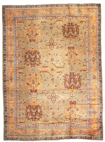 An Oushak carpet West Anatolia, Size approximately 15ft x 11ft