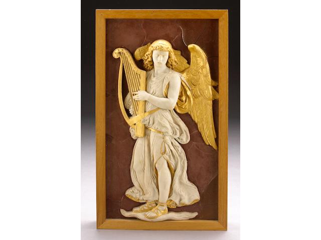 A carved white marble and parcel gilt relief panel of an angel with harp on a faux rosso antico ground