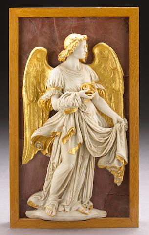 A carved white marble and parcel gilt relief panel of an angel with dice and cloak on a faux rosso antico ground