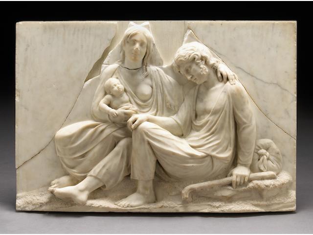 A carved marble relief panel of the Flight into Egypt