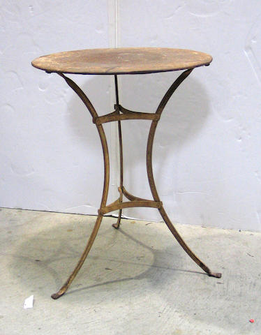 A Napoleon III patinated iron bistro table
