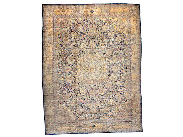 A Kashan carpet Central Persia, Size approximately 16ft 2in x 12ft 2in
