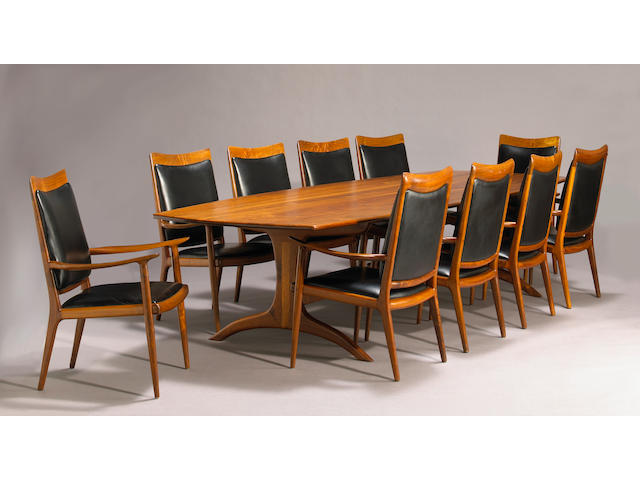 A fine Sam Maloof carved walnut conference table and ten armchairs