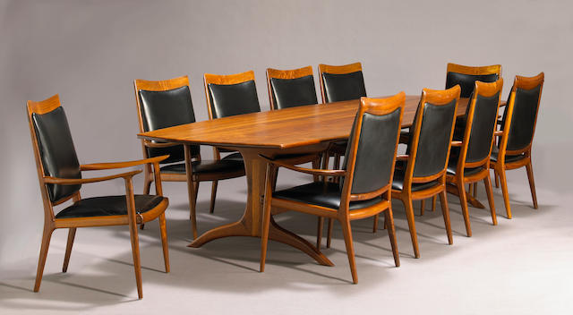 A fine Sam Maloof carved walnut conference table and ten armchairs