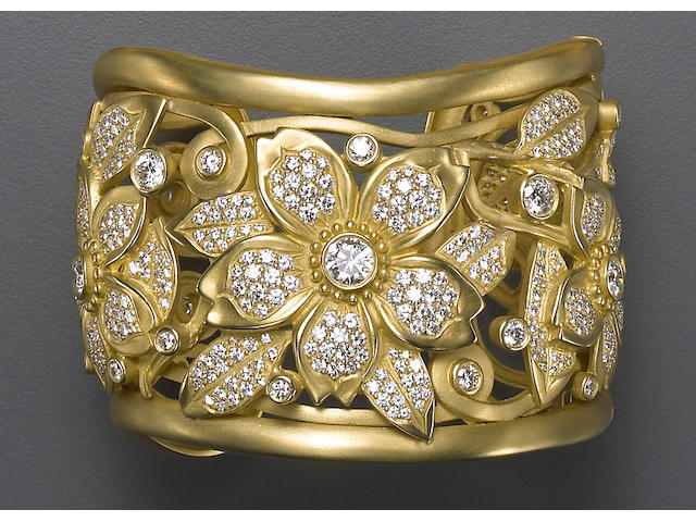 A diamond and eighteen karat gold bangle bracelet, Kieselstein Cord