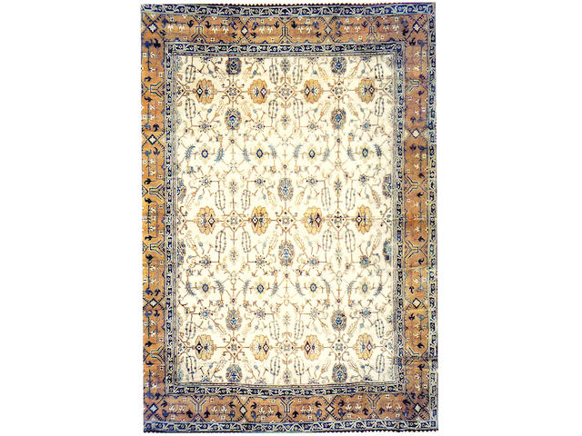 An Agra carpet India, Size approximately 17ft 4in x 14ft 2in