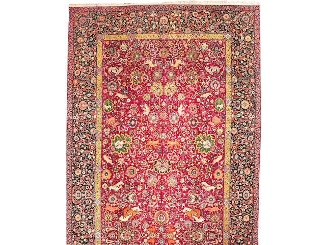 A Tabriz carpet Northwest Persia, Size approximately 25ft 4in x 10ft 9in