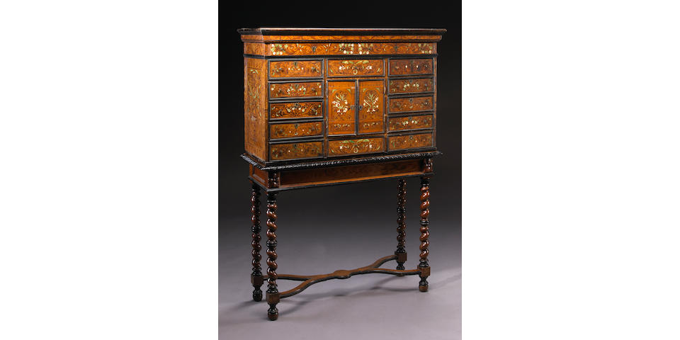 A Louis XIII parcel ebonized marquetry cabinet on later stand