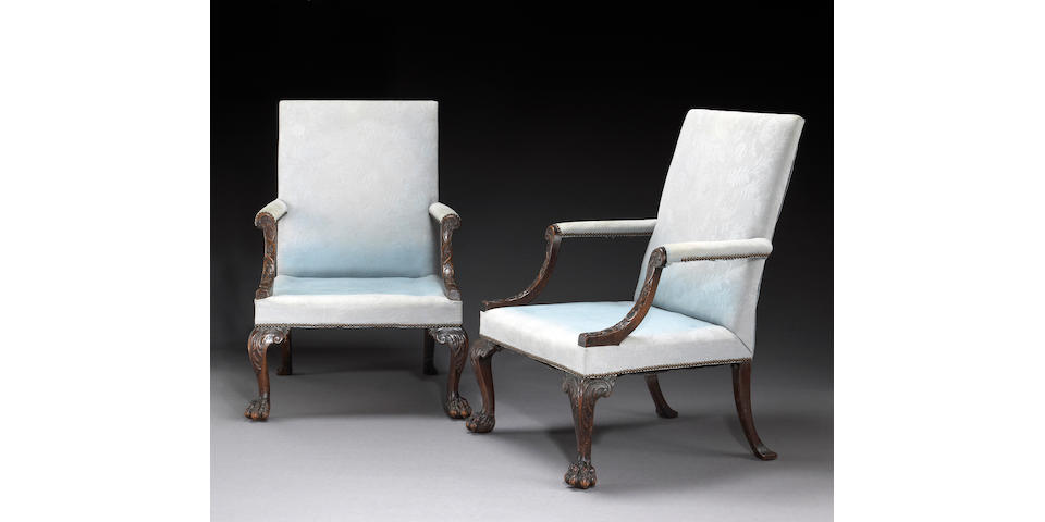 A fine pair of early George III mahogany library chairs