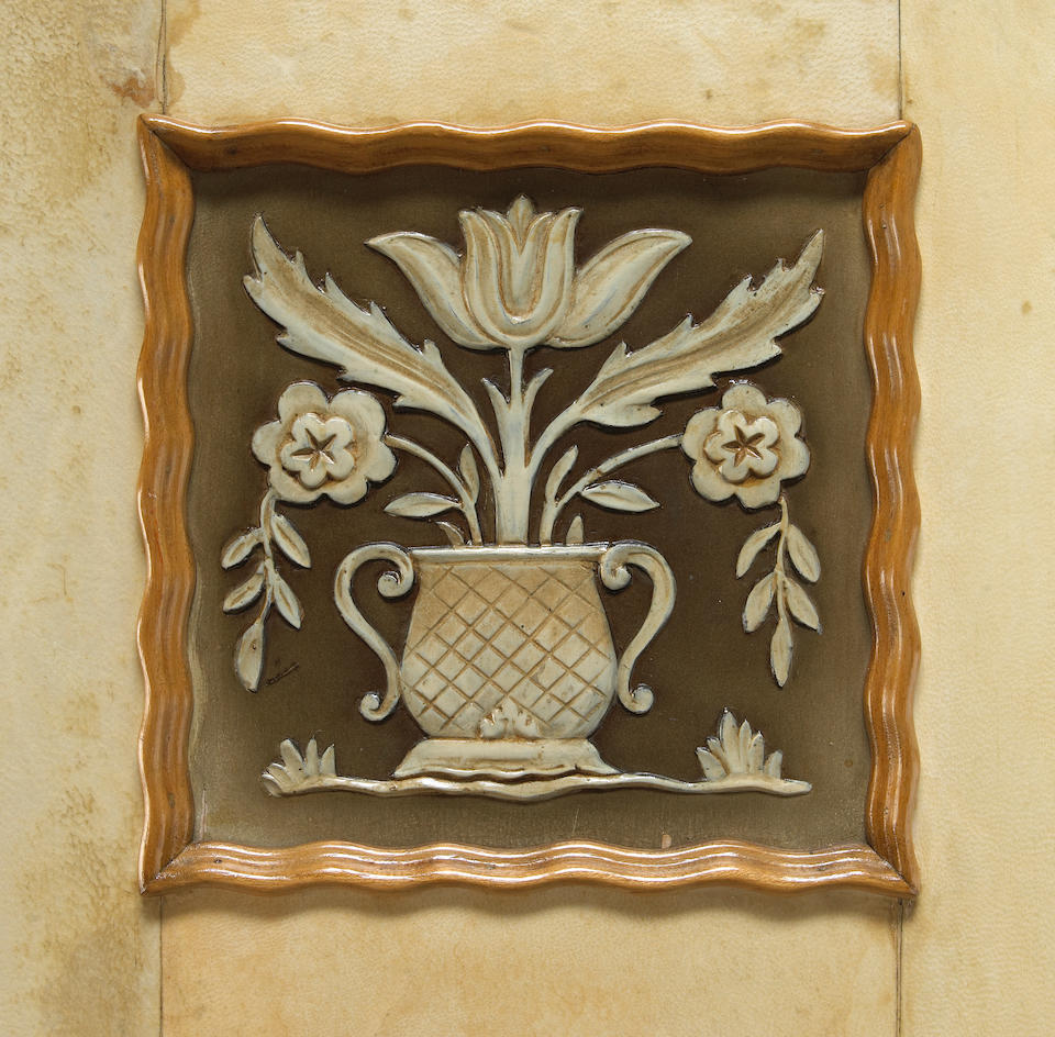 An Italian parchment cabinet