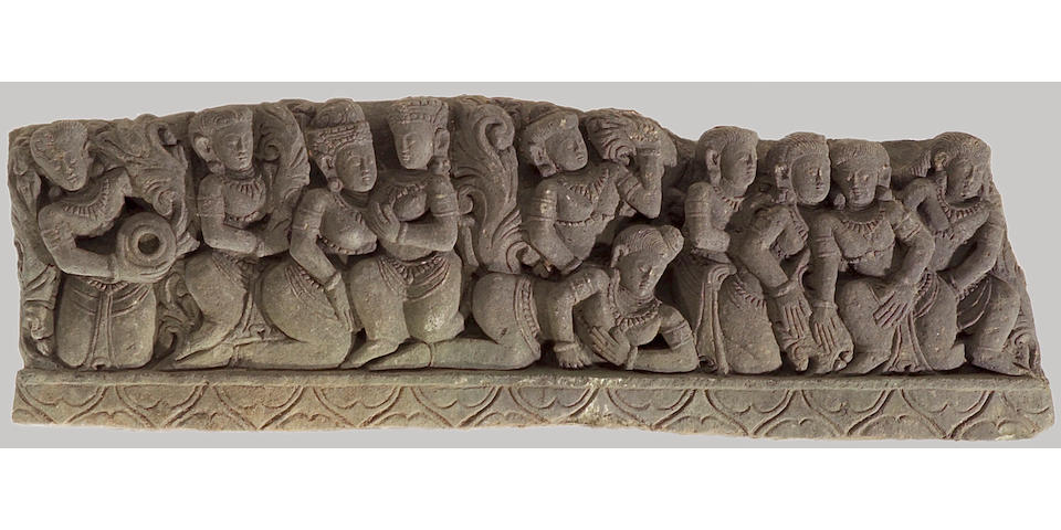 A Southeast Asian carved stone figural relief panel
