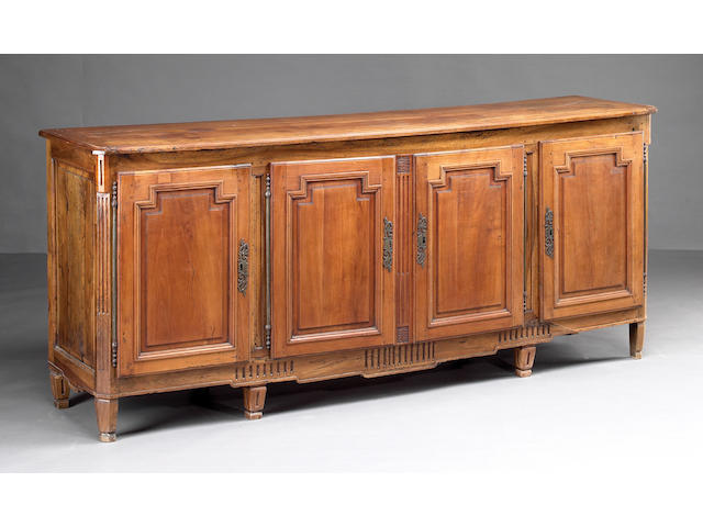 A Louis XVI fruitwood and walnut enfilade
