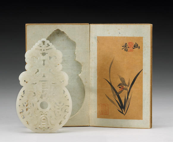 A fine and rare white jade pendant and imperial storage box Qianlong Mark and Period