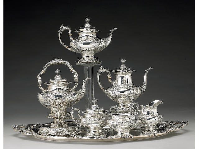 A sterling six piece tea and coffee set with matching tray Reed & Barton, Taunton, MA, dated 1948