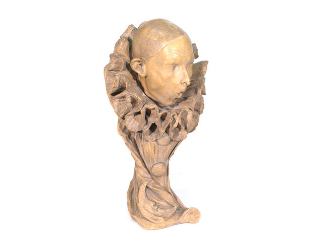 A French glazed terracotta bust of a pierrot