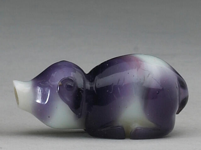 A purple overlay Peking glass snuff bottle in form of a pig