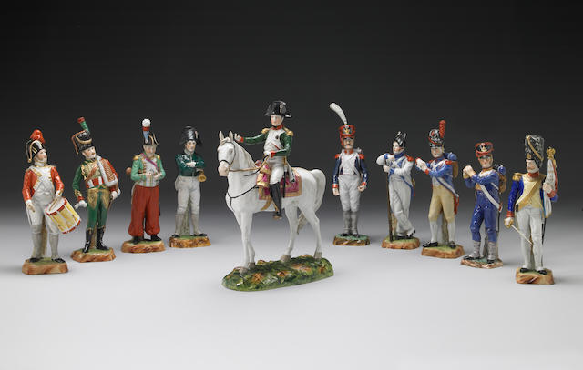 A group of ten porcelain figures, one modelled as Napoleon on horseback