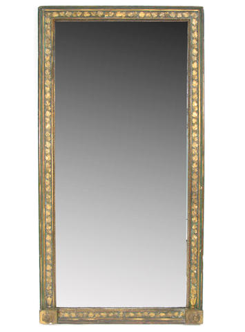 A Louis XVI style carved wood and gesso parcel gilt mirror
