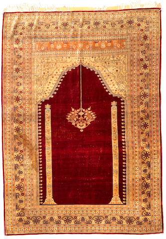 A Tabriz silk rug Northwest Persia size approximately 6ft 5in x 4ft 7in