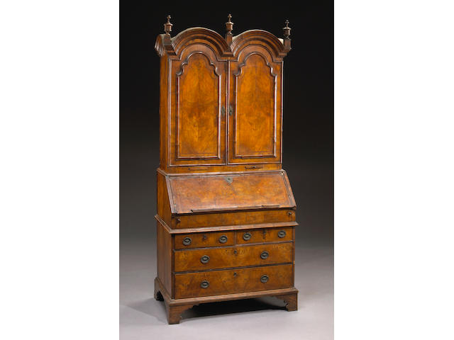A good Queen Anne walnut double domed top secretary cabinet