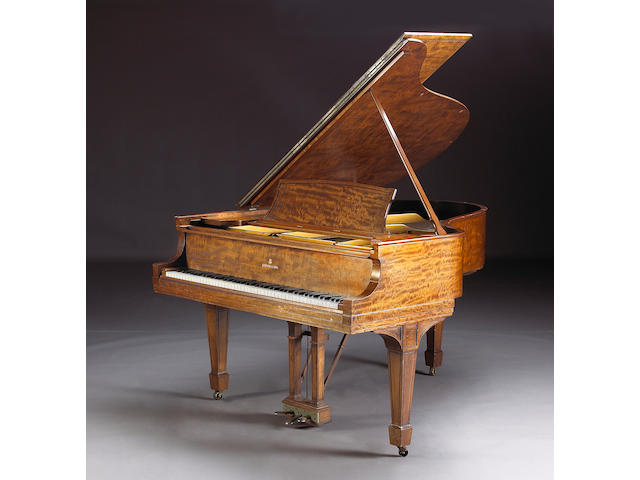 A Steinway & Sons mahogany grand piano