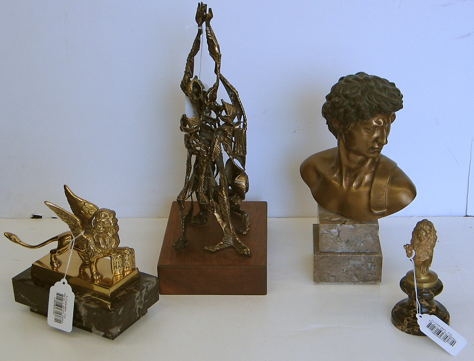 An assembled grouping of bronze sculpture