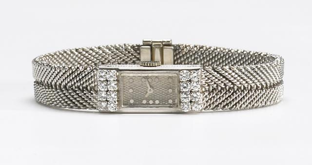 Boucheron, Paris. An 18k white gold and diamond set bracelet watchNo.75341, 1950s